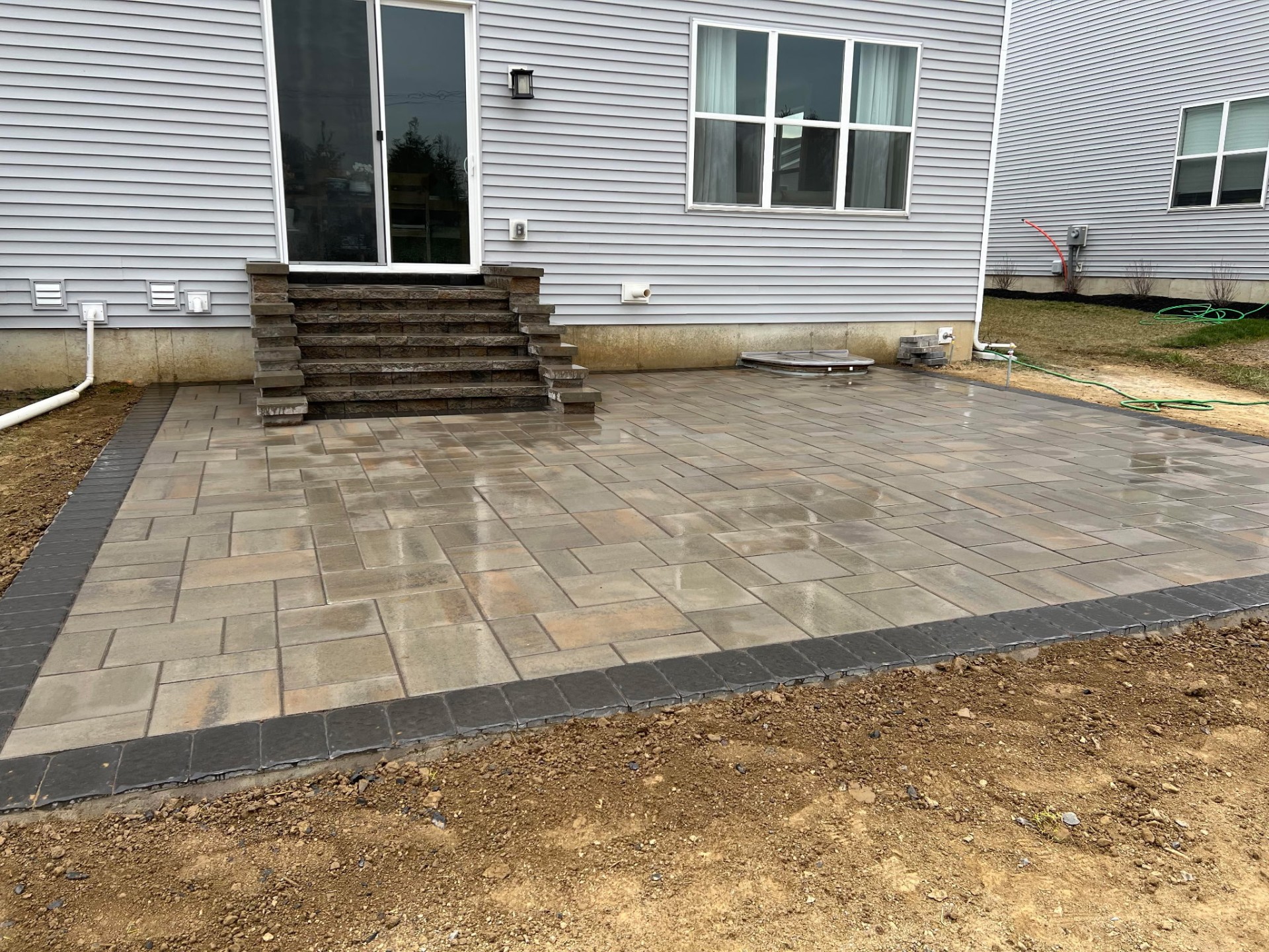 Luxury masonry patio at dusk